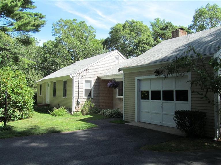 37 Valley Brook Road Centerville, MA 02632 - Photo 19 of 26 a view of a back yard of the house