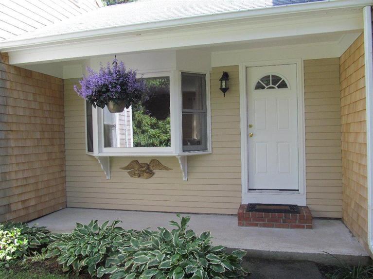 37 Valley Brook Road Centerville, MA 02632 - Photo 2 of 26 a front view of a house with plants