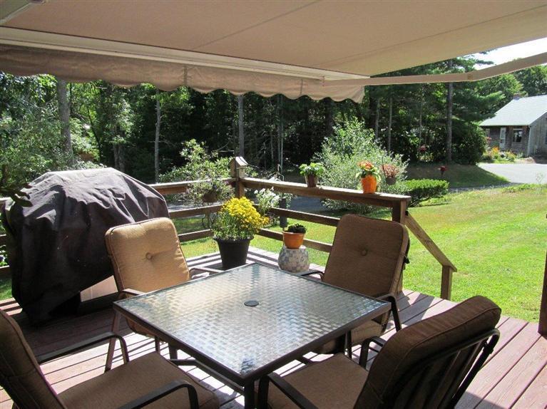 37 Valley Brook Road Centerville, MA 02632 - Photo 21 of 26 a outdoor dining space with furniture and outdoor view
