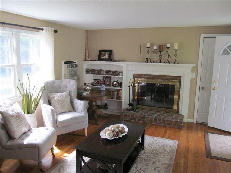 37 Valley Brook Road Centerville, MA 02632 - Photo 8 of 26 a living room with furniture and a fireplace