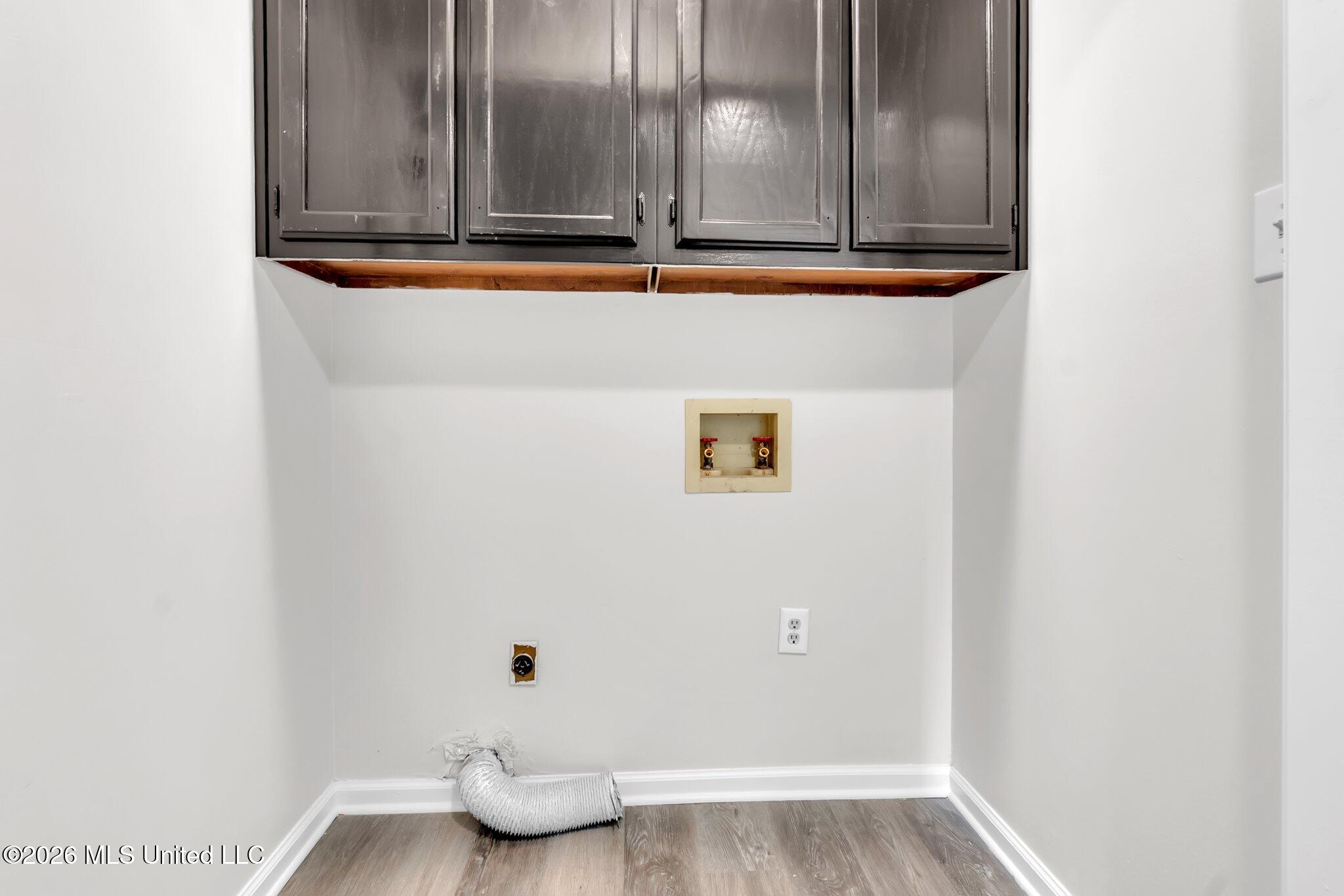 7338 Alexander Road Olive Branch, MS 38654 - Photo 17 of 36 Laundry Closet