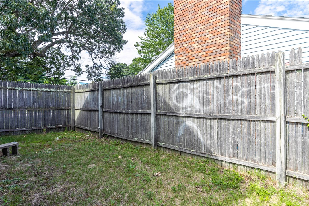 2537 West Shore Road Warwick, RI 02889 - Photo 19 of 21 Graffiti on fence