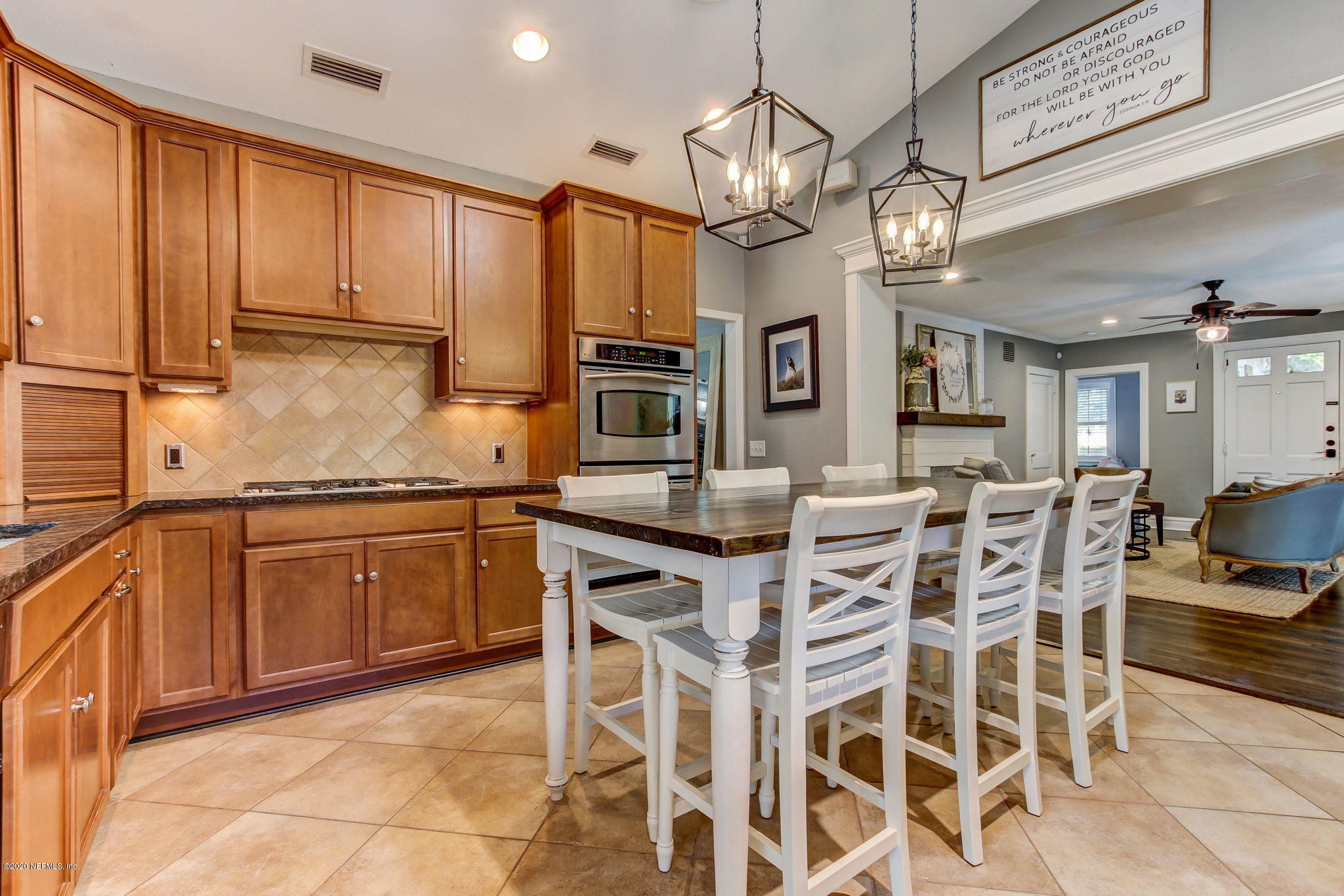 4121 London Road Jacksonville, FL 32207 - Photo 17 of 38 a kitchen with a counter space cabinets and appliances