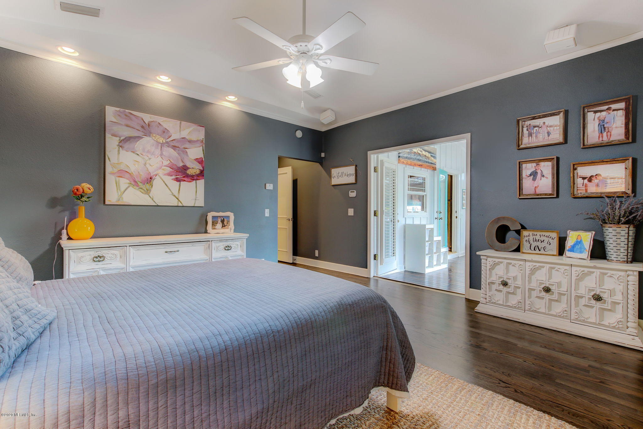 4121 London Road Jacksonville, FL 32207 - Photo 22 of 38 a bedroom with a bed and a cabinets