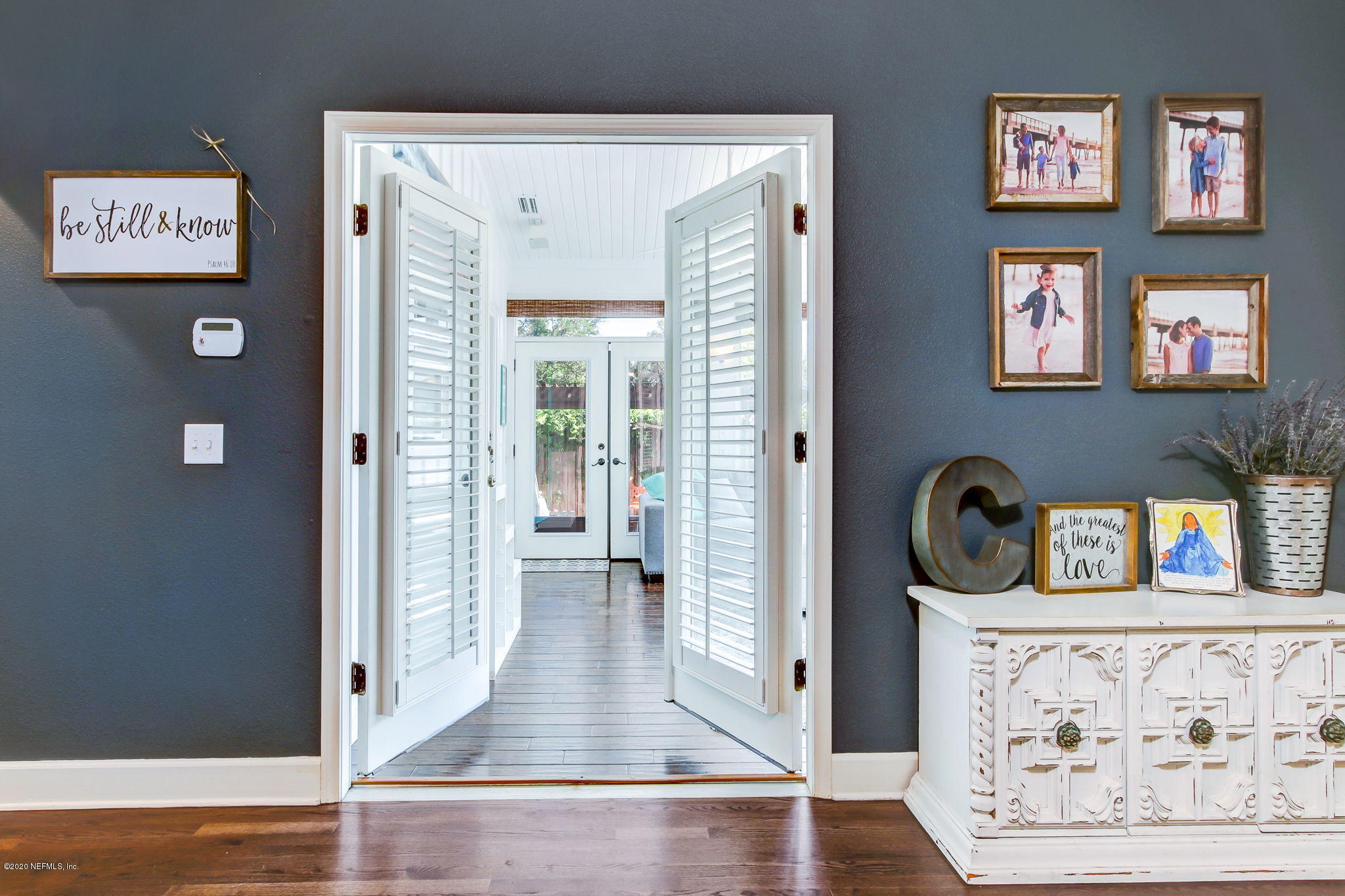 4121 London Road Jacksonville, FL 32207 - Photo 23 of 38 a view of a hallway with wooden floor and entryway