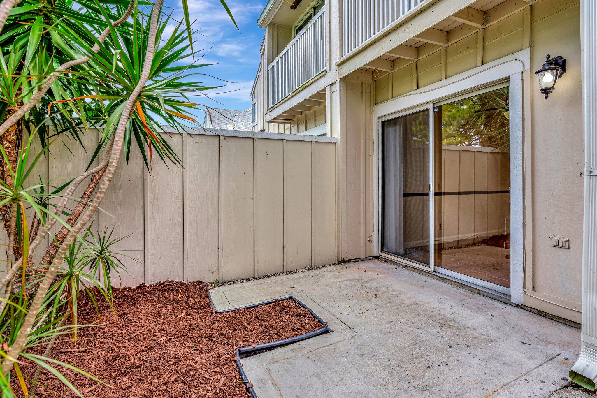 6327 Riverwalk Lane, Unit 4 Jupiter, FL 33458 - Photo 19 of 23 Back Patio