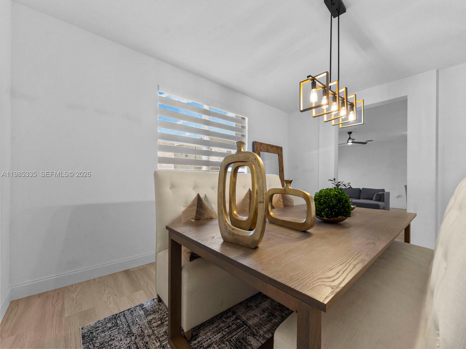 13391 Southwest 285th Street Homestead, FL 33033 - Photo 12 of 37 a view of a table and a table in a room