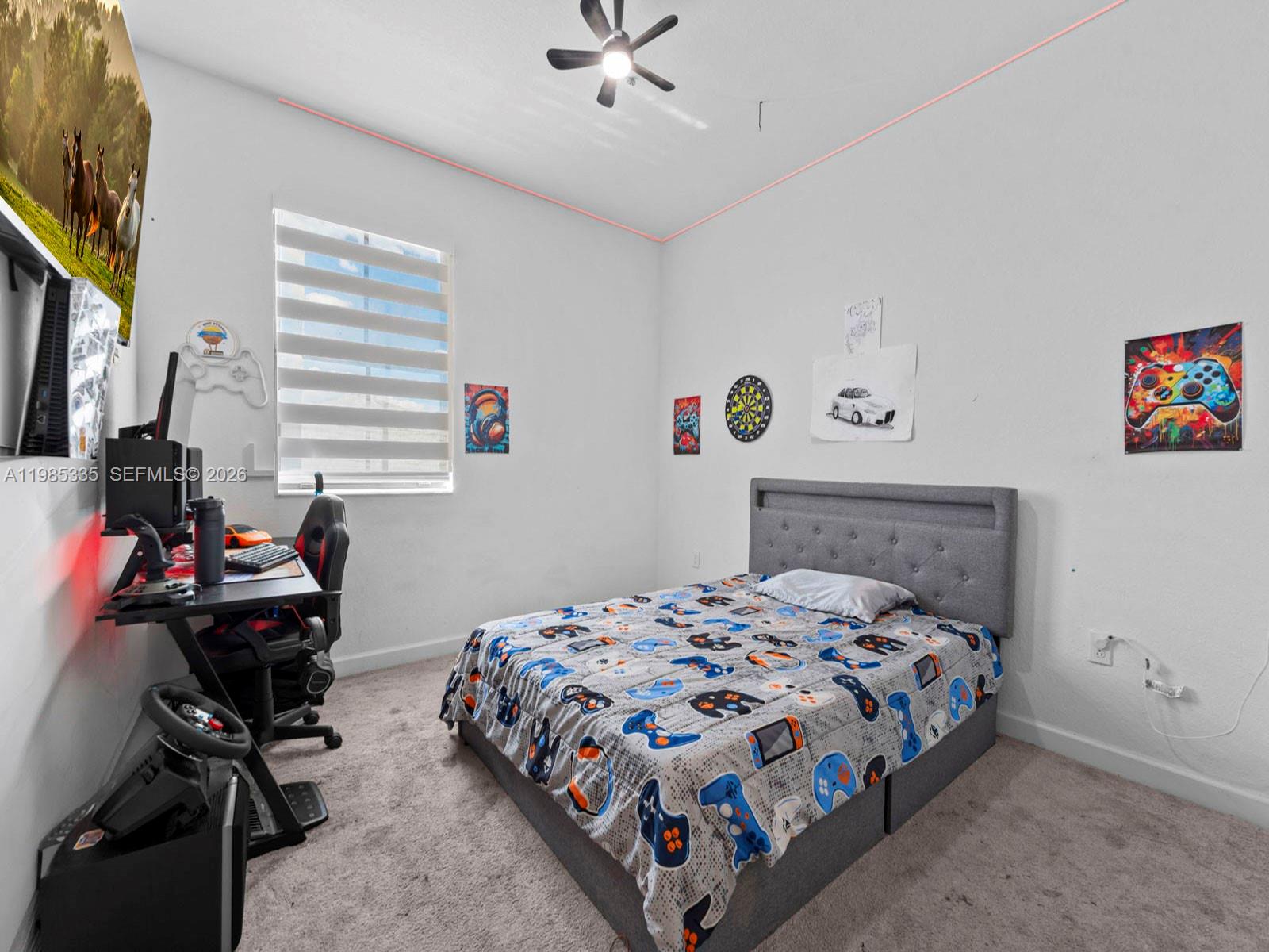 13391 Southwest 285th Street Homestead, FL 33033 - Photo 25 of 37 a bedroom with a bed and a window