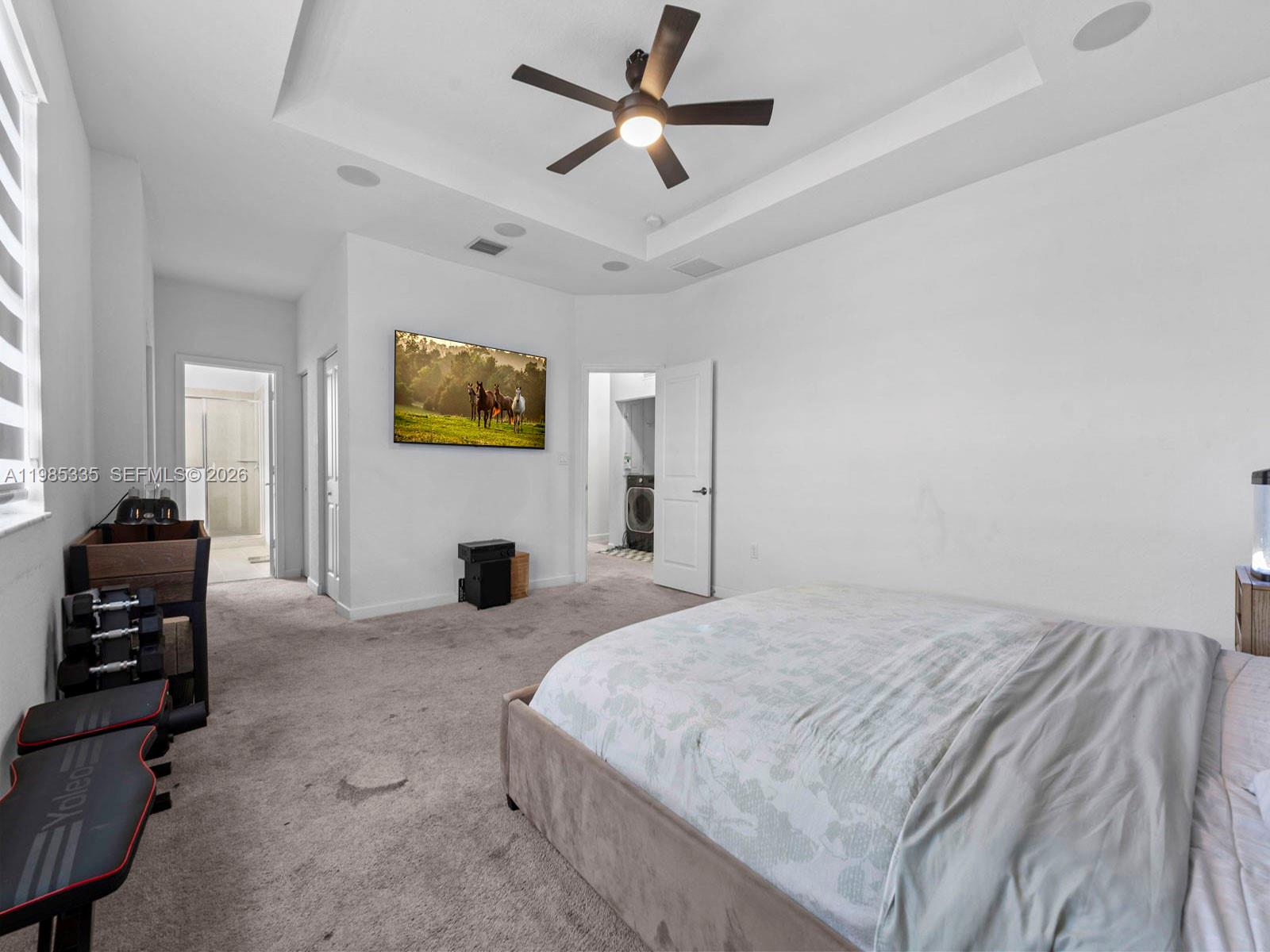 13391 Southwest 285th Street Homestead, FL 33033 - Photo 31 of 37 a bedroom with a bed and a chair