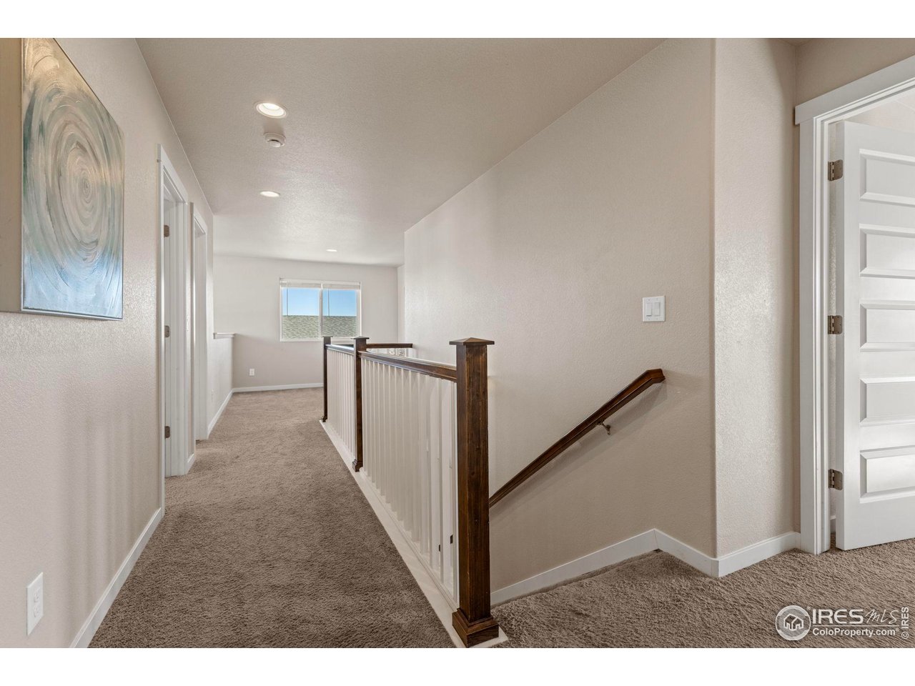 1223 Chilcott Street Berthoud, CO 80513 - Photo 13 of 38 Upstairs Hallway