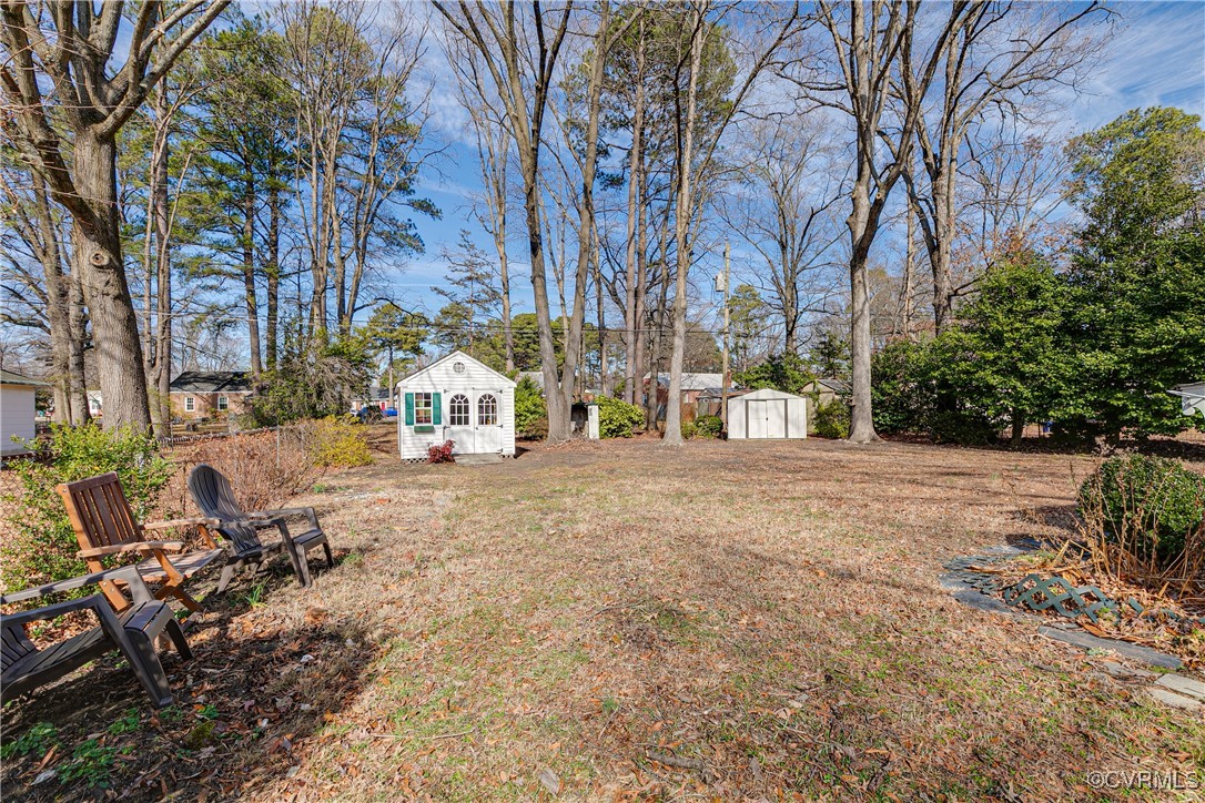 7204 Vernon Road Henrico, VA 23228 - Photo 23 of 27 View of yard featuring a storage unit