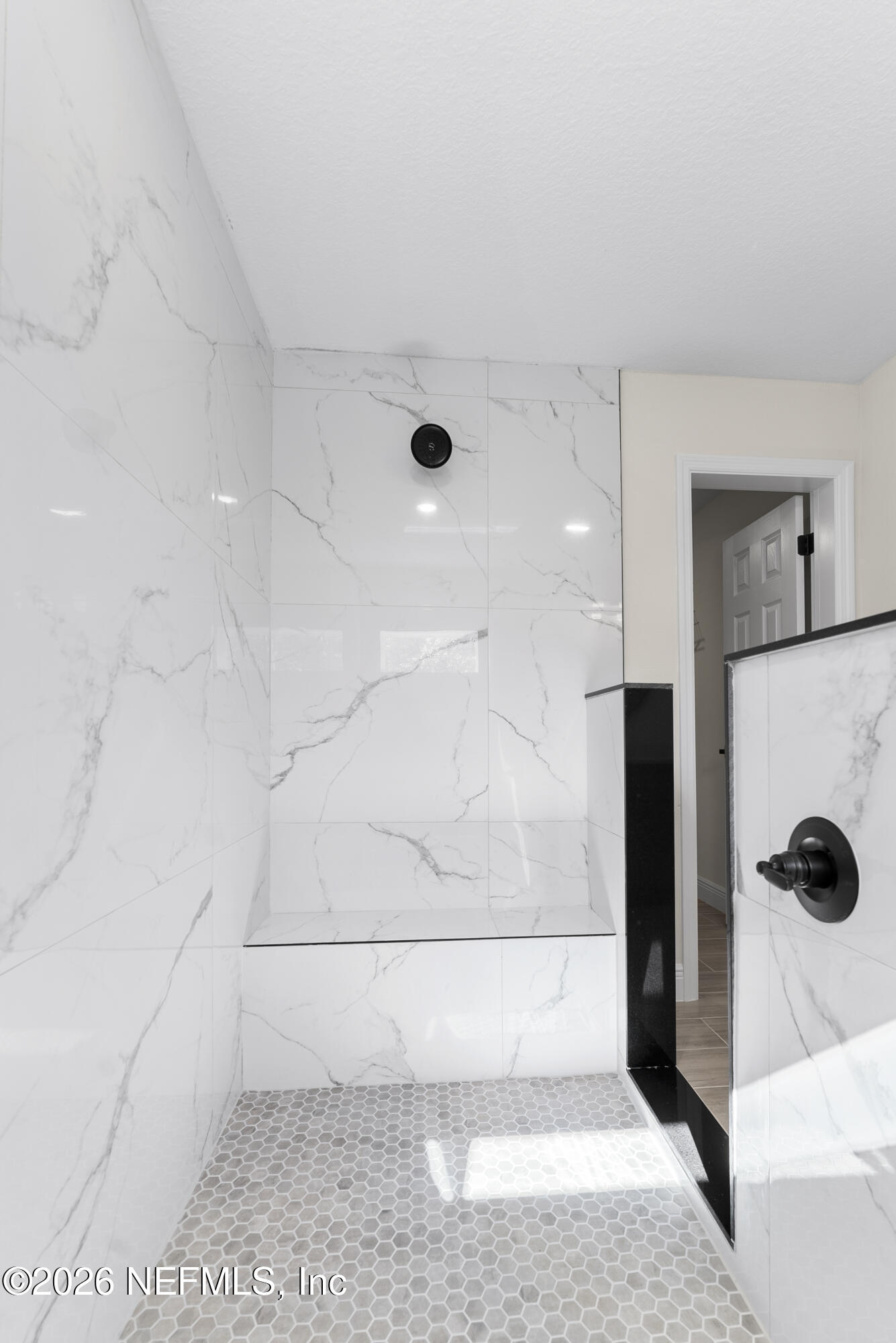 16521 Southwest 31st Terrace Ocala, FL 34473 - Photo 16 of 40 Walk-in shower with bench