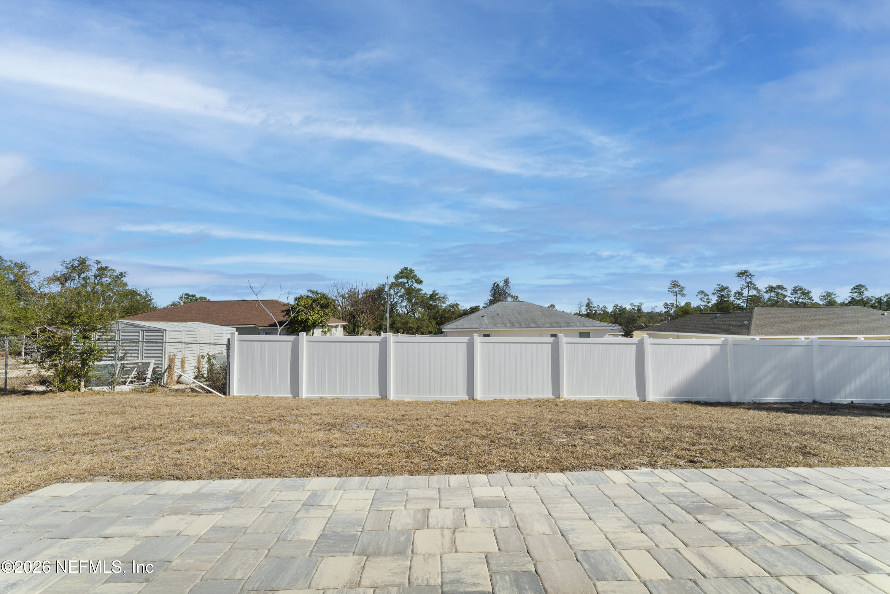 16521 Southwest 31st Terrace Ocala, FL 34473 - Photo 33 of 40 Patio with pavers and partial fences