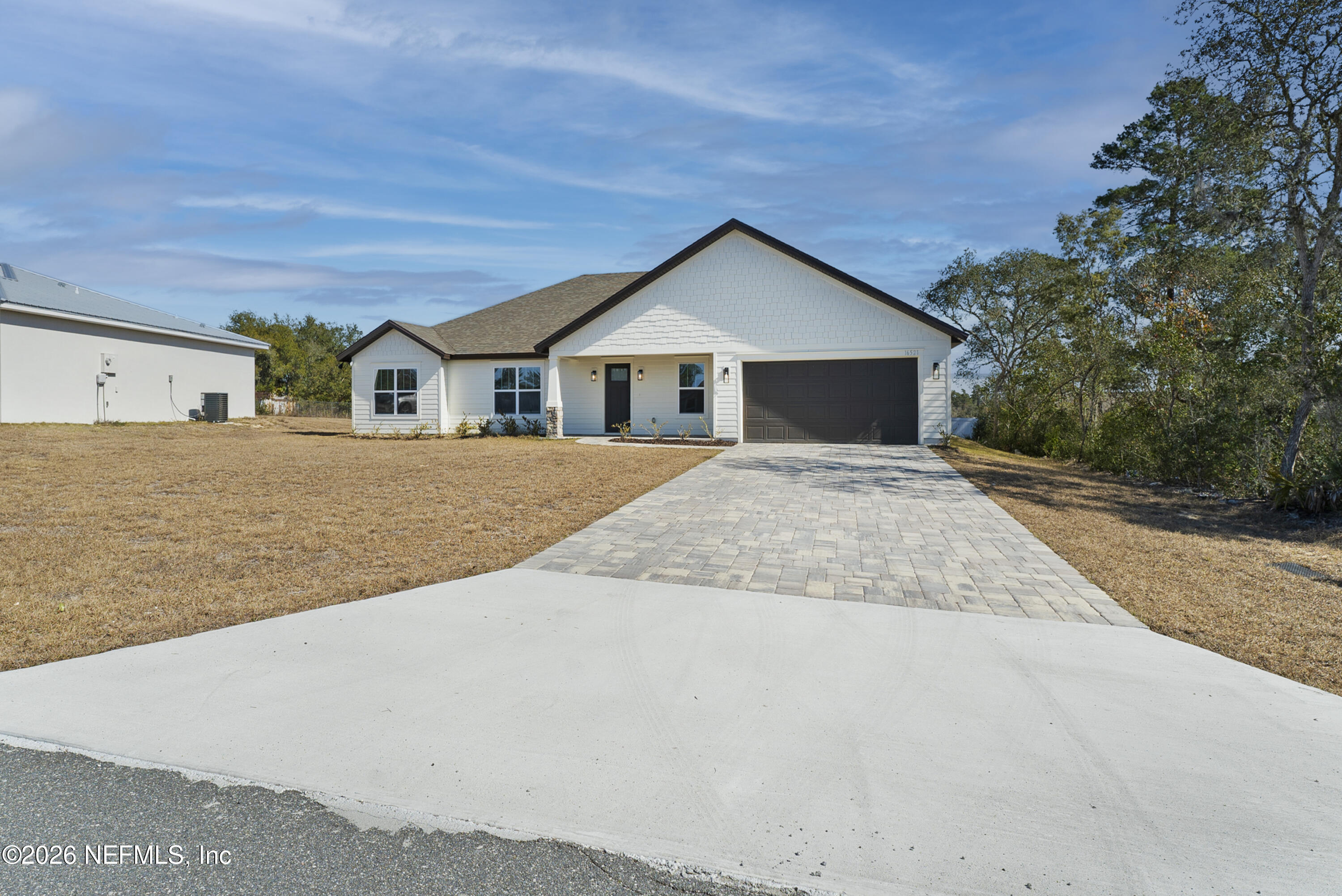 16521 Southwest 31st Terrace Ocala, FL 34473 - Photo 36 of 40 Driveway and Porch with pavers