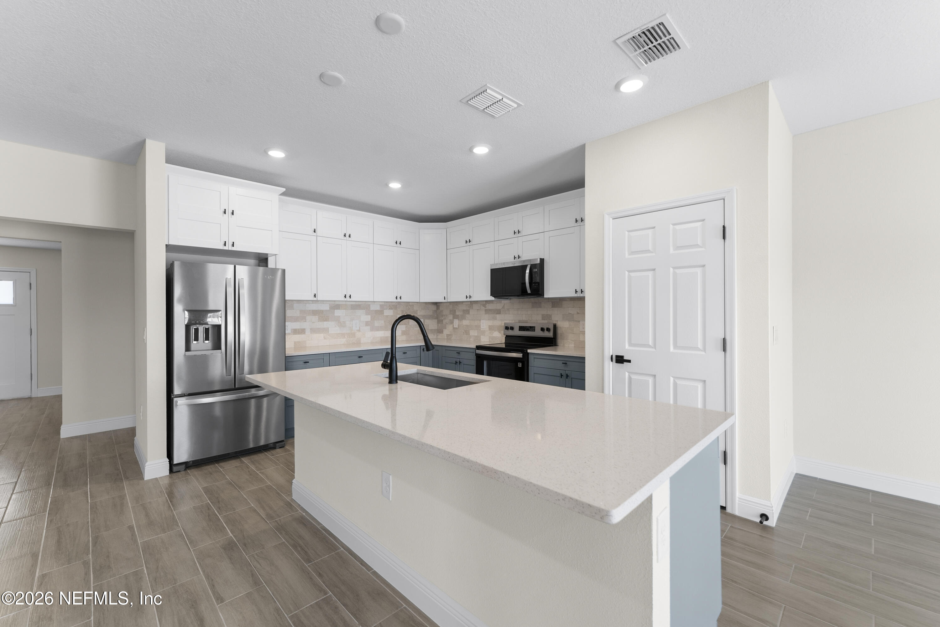 16521 Southwest 31st Terrace Ocala, FL 34473 - Photo 7 of 40 Kitchen with pantry closet