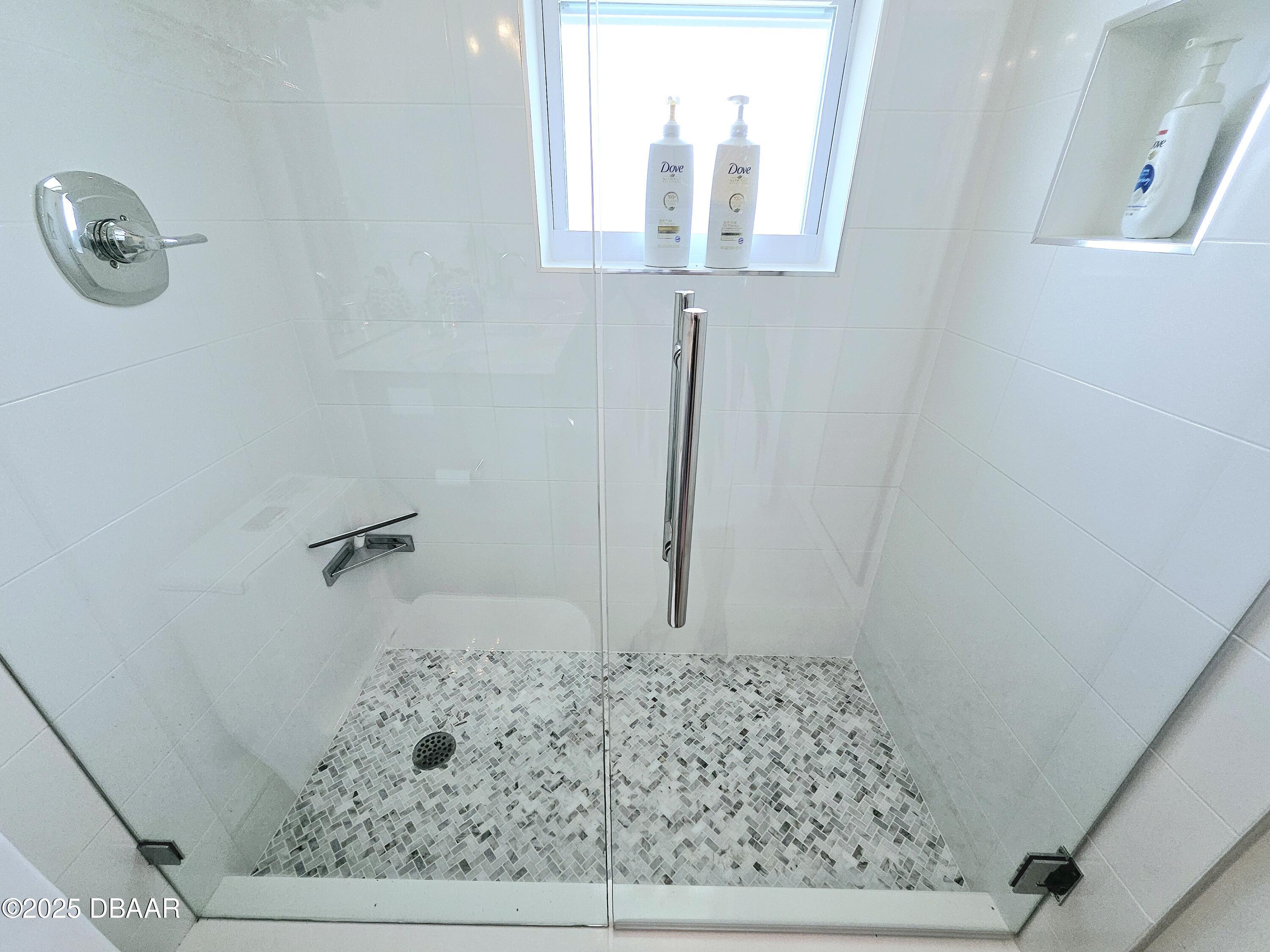 13 Sunrise Avenue Ormond Beach, FL 32176 - Photo 28 of 52 a bathroom with a granite countertop sink and a mirror