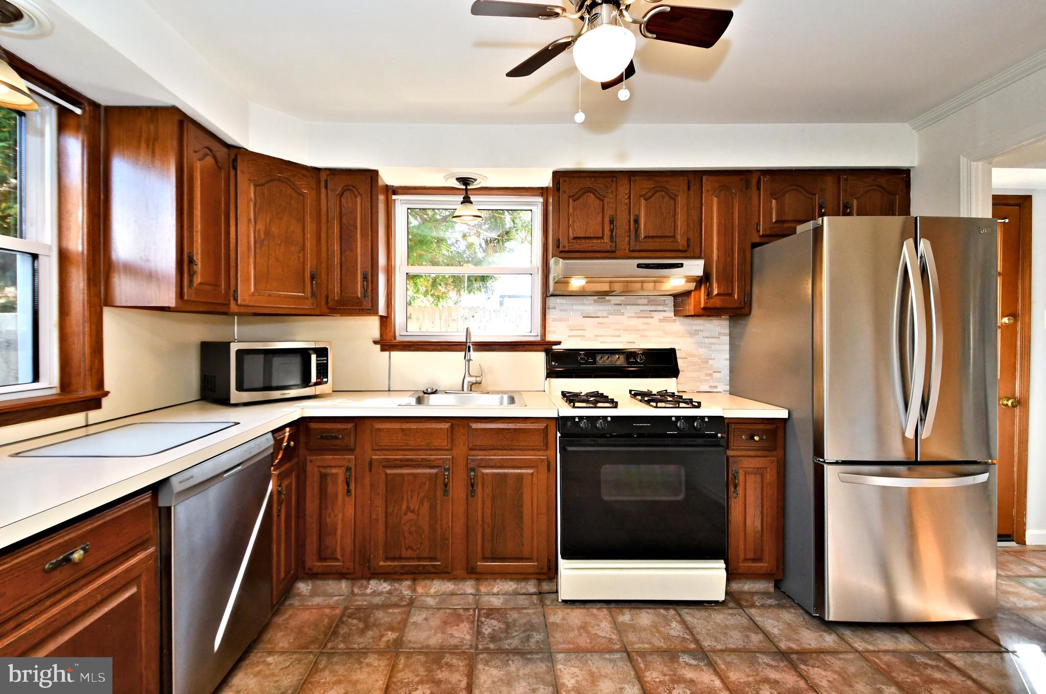 1006 East Heather Road Oreland, PA 19075 - Photo 15 of 42 Kitchen with dishwasher