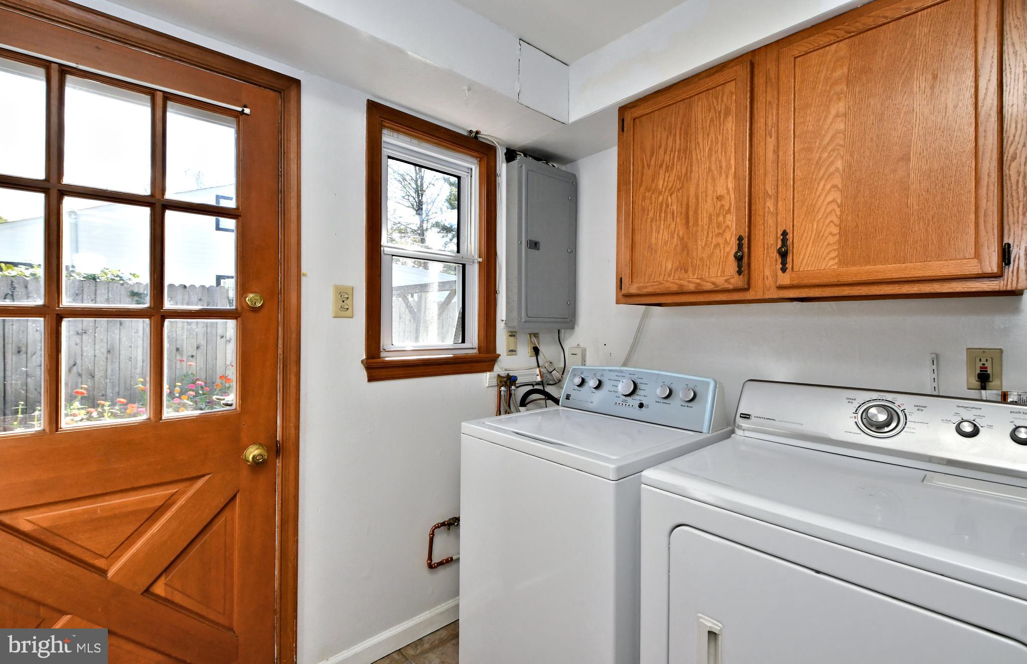 1006 East Heather Road Oreland, PA 19075 - Photo 20 of 42 Laundry room with exit to private rear patio