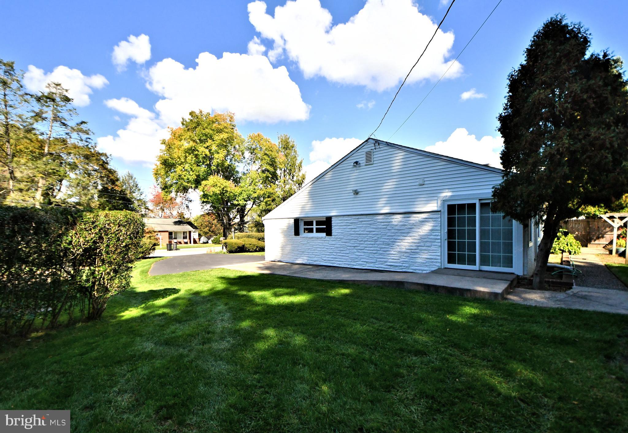 1006 East Heather Road Oreland, PA 19075 - Photo 37 of 42 Side yard patio off of bedroom #1