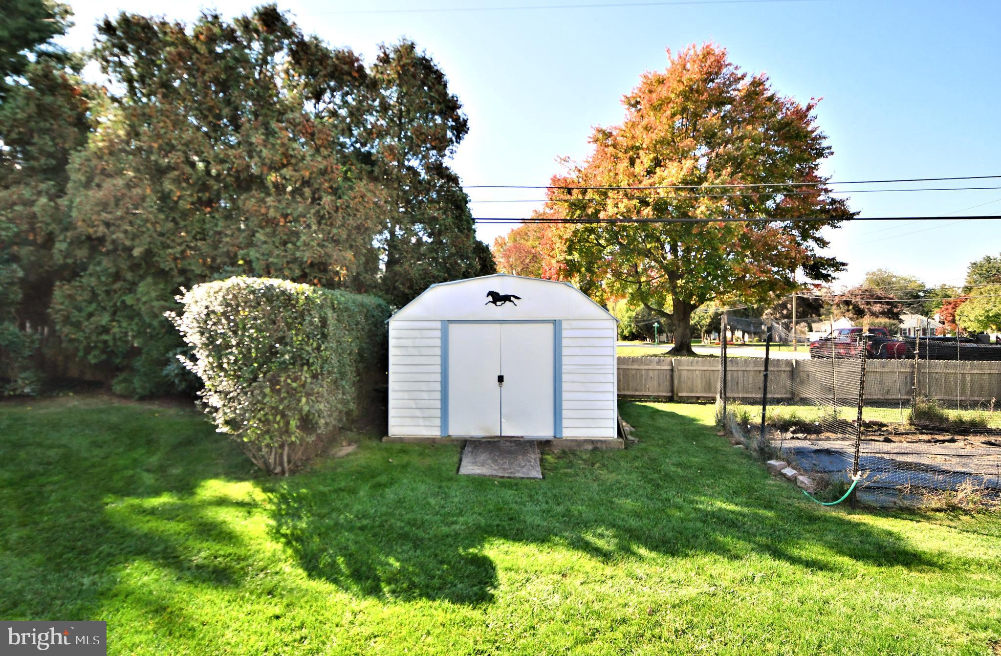 1006 East Heather Road Oreland, PA 19075 - Photo 39 of 42 Side yard with shed