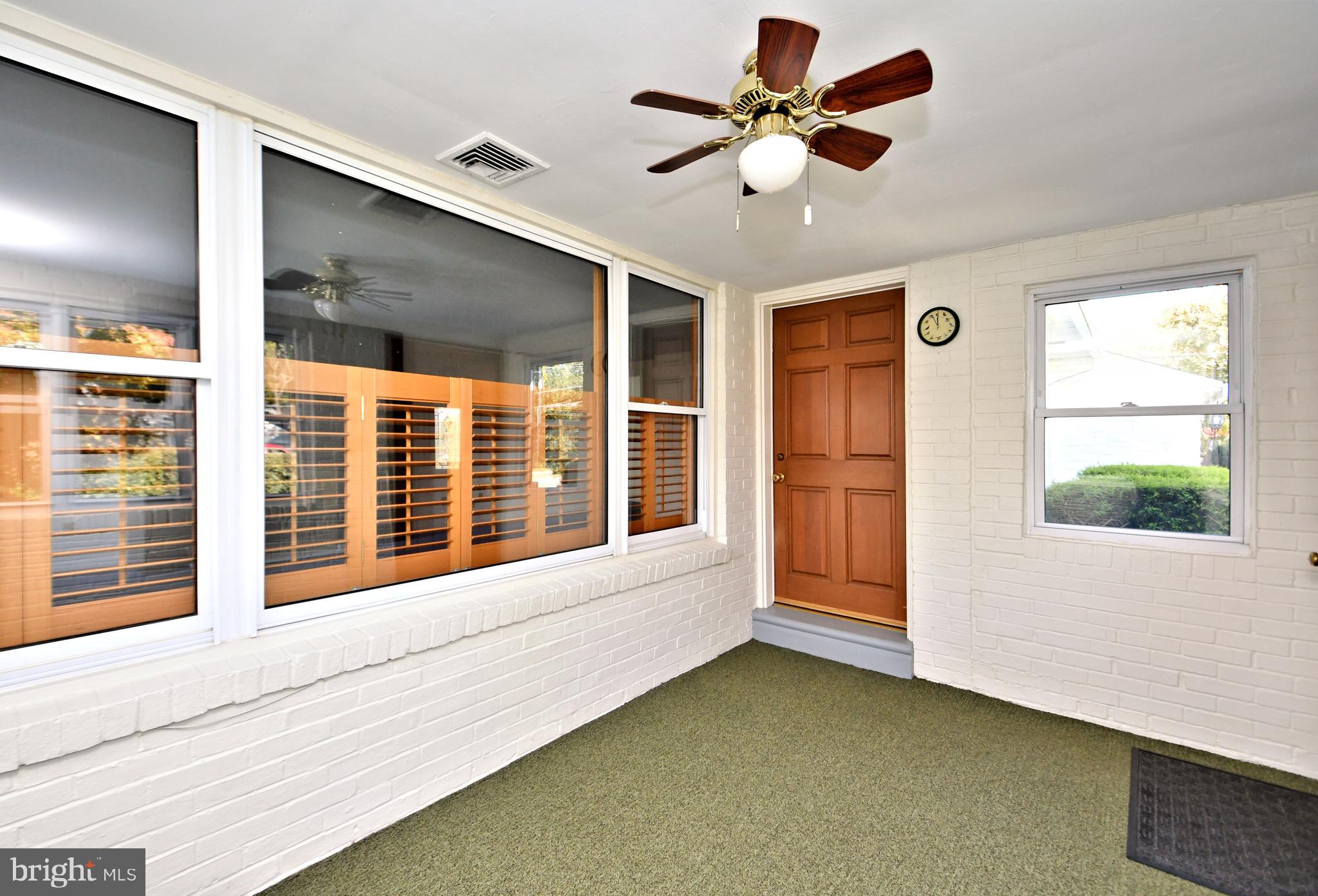 1006 East Heather Road Oreland, PA 19075 - Photo 4 of 42 Enclosed porch
