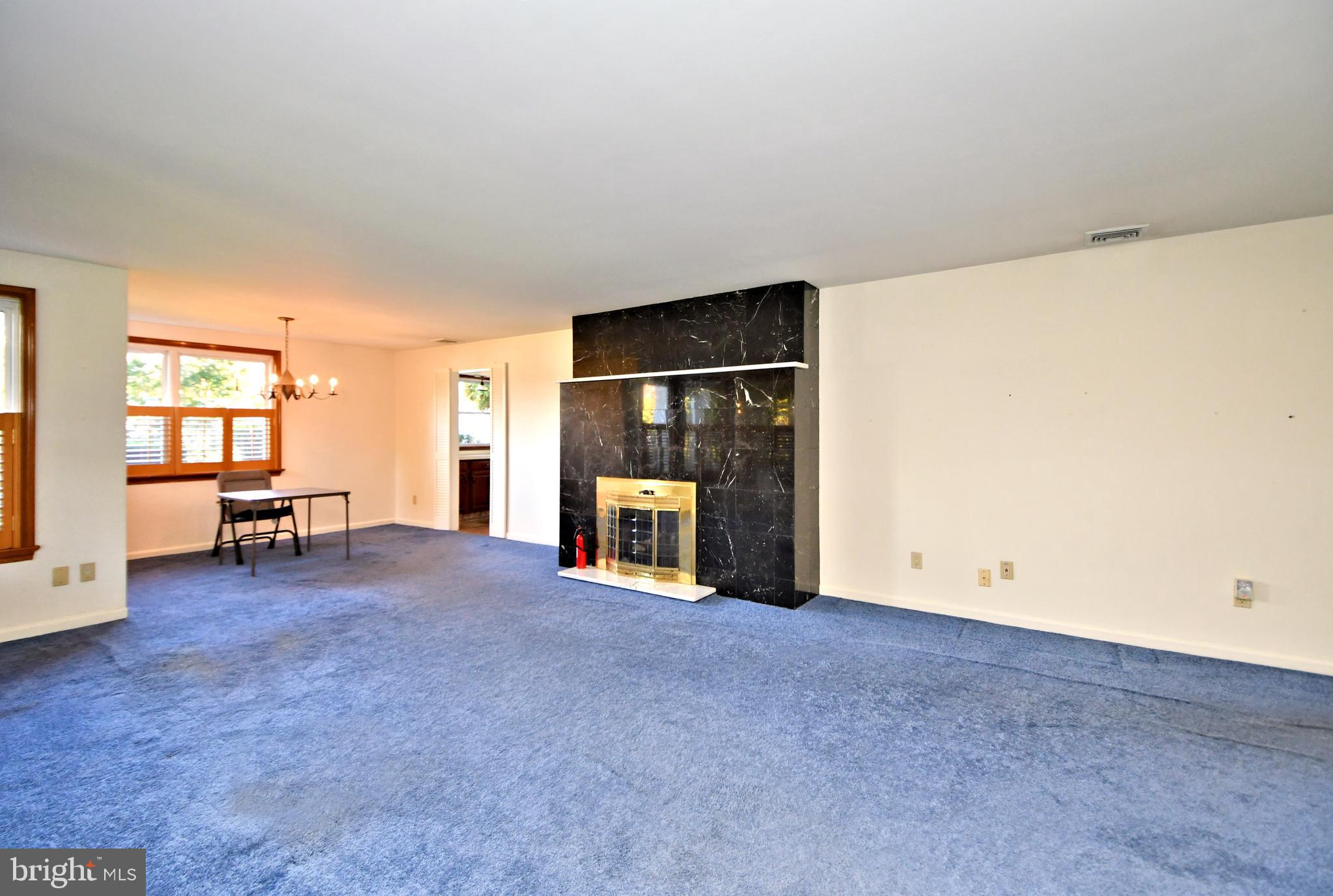 1006 East Heather Road Oreland, PA 19075 - Photo 5 of 42 Living room with gas fireplace