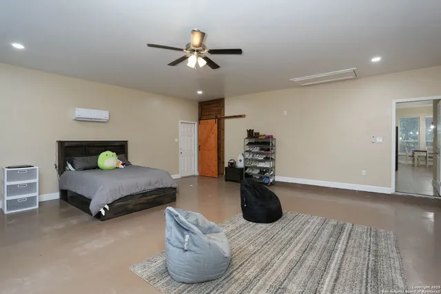 a utility room with cabinets dryer and washer