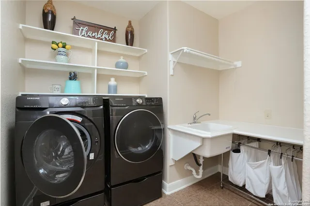 a view of a park with large trees