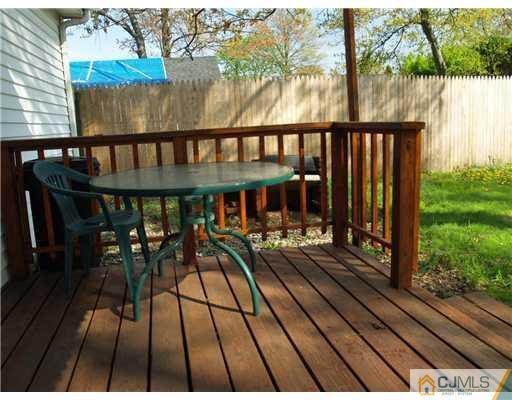 28 Stiles Road Edison, NJ 08817 - Photo 14 of 25 a view of a balcony with chairs