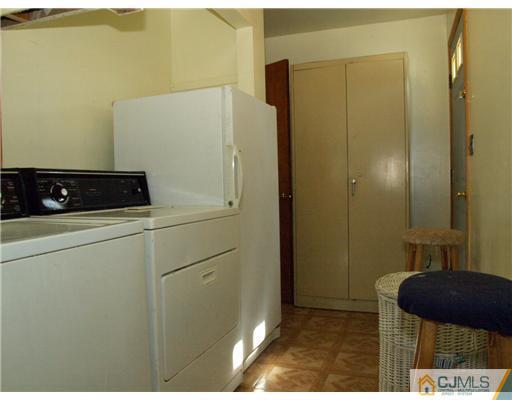 28 Stiles Road Edison, NJ 08817 - Photo 21 of 25 a room with storage and utility