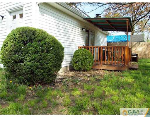 28 Stiles Road Edison, NJ 08817 - Photo 25 of 25 a view of a backyard with plants