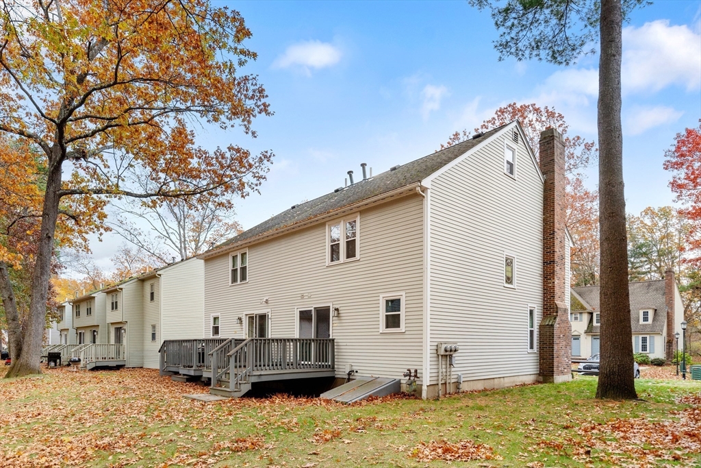 730 Wellman Avenue, Unit 730 Chelmsford, MA 01863 - Photo 25 of 31 a view of a house with snow on the road