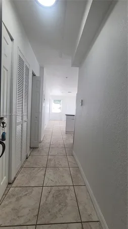 a view of kitchen with windows