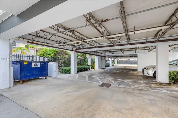 a view of water heater room with stairs