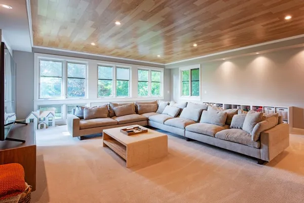a bedroom with a bed and a fireplace