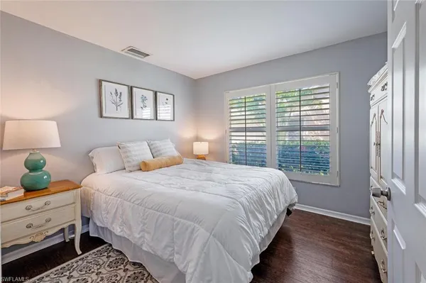 a view of a swimming pool with a lounge chair