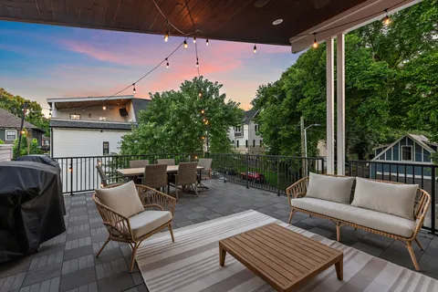a view of a patio with couches and a table