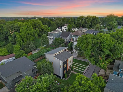 an aerial view of a house with a garden