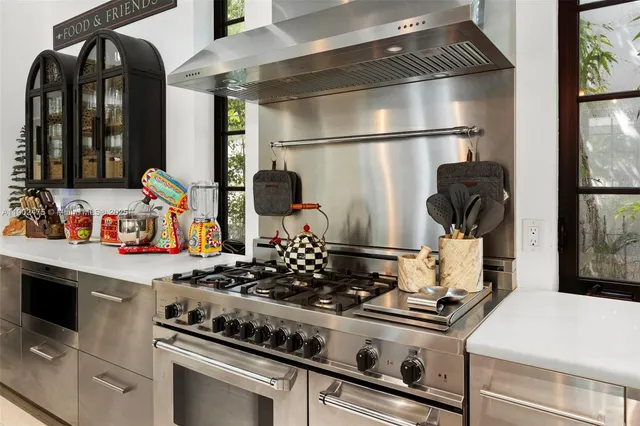 a bedroom with a bed and a flat tv screen