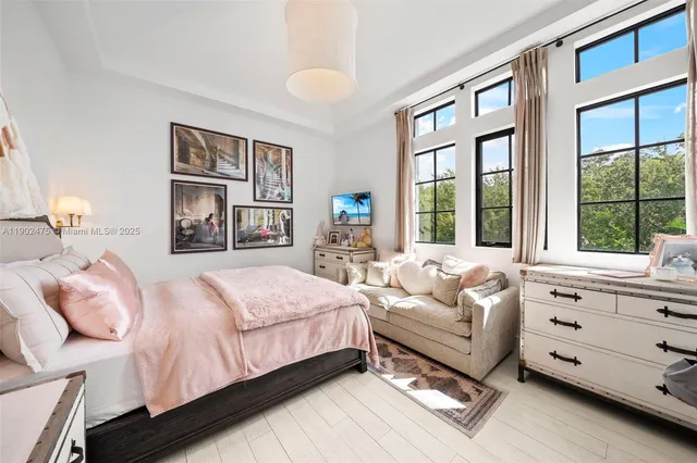 an aerial view of a house with a garden