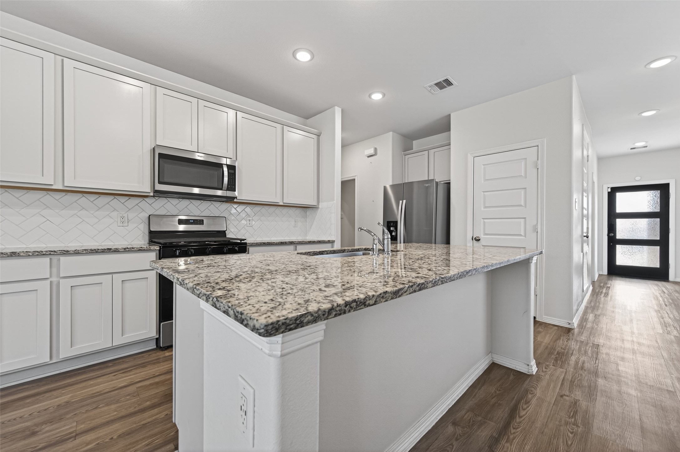 23222 Spring Genesis Lane Katy, TX 77493 - Photo 15 of 43 Granite countertops are well-suited for culinary activities and hospitality.