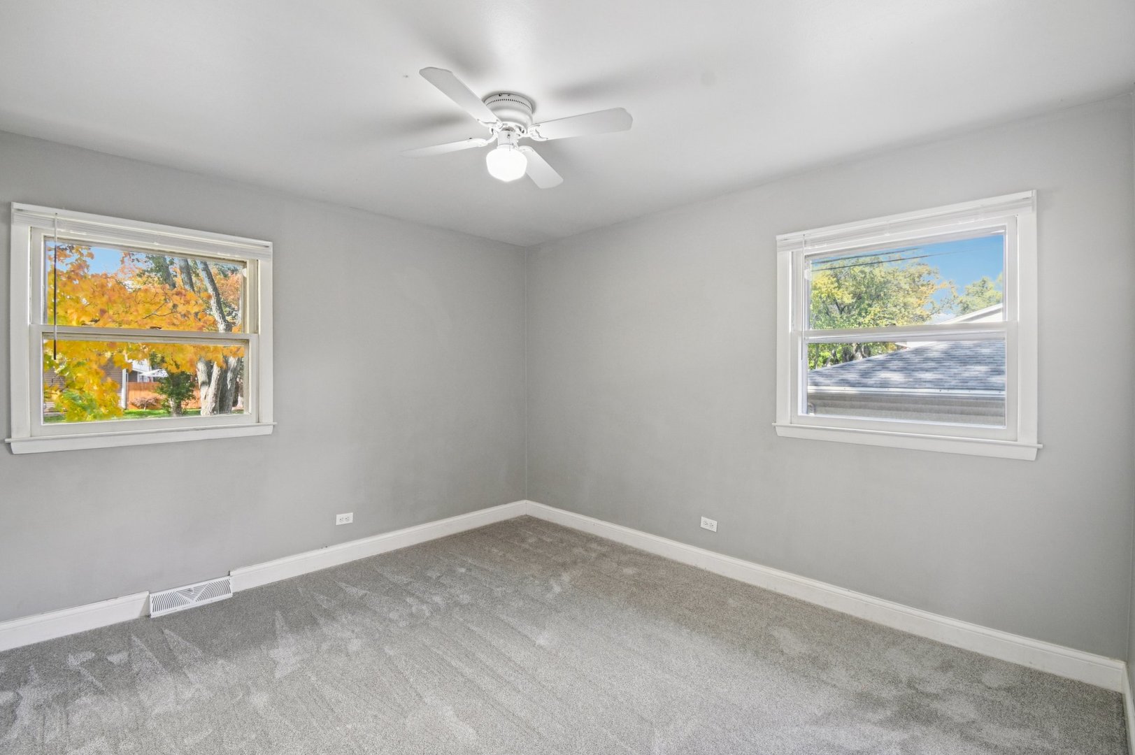207 North Idlewild Avenue Mundelein, IL 60060 - Photo 27 of 46 a view of room with window and ceiling fan