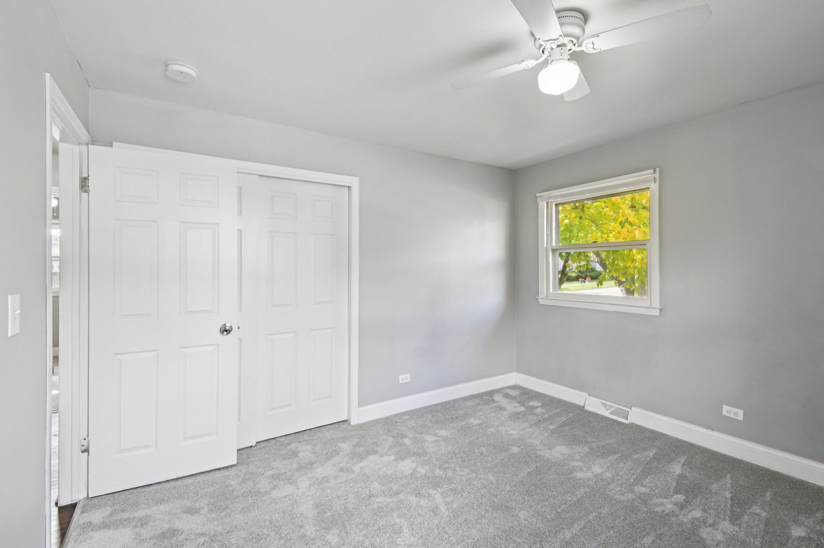 207 North Idlewild Avenue Mundelein, IL 60060 - Photo 30 of 46 wooden floor in an empty room with a window