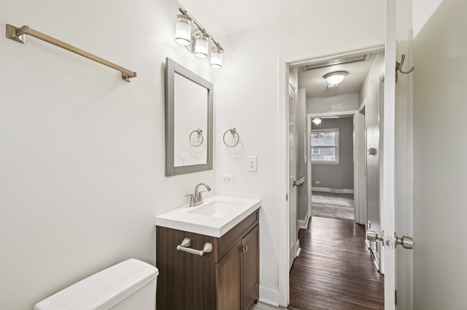 207 North Idlewild Avenue Mundelein, IL 60060 - Photo 34 of 46 a bathroom with a sink a toilet and shower