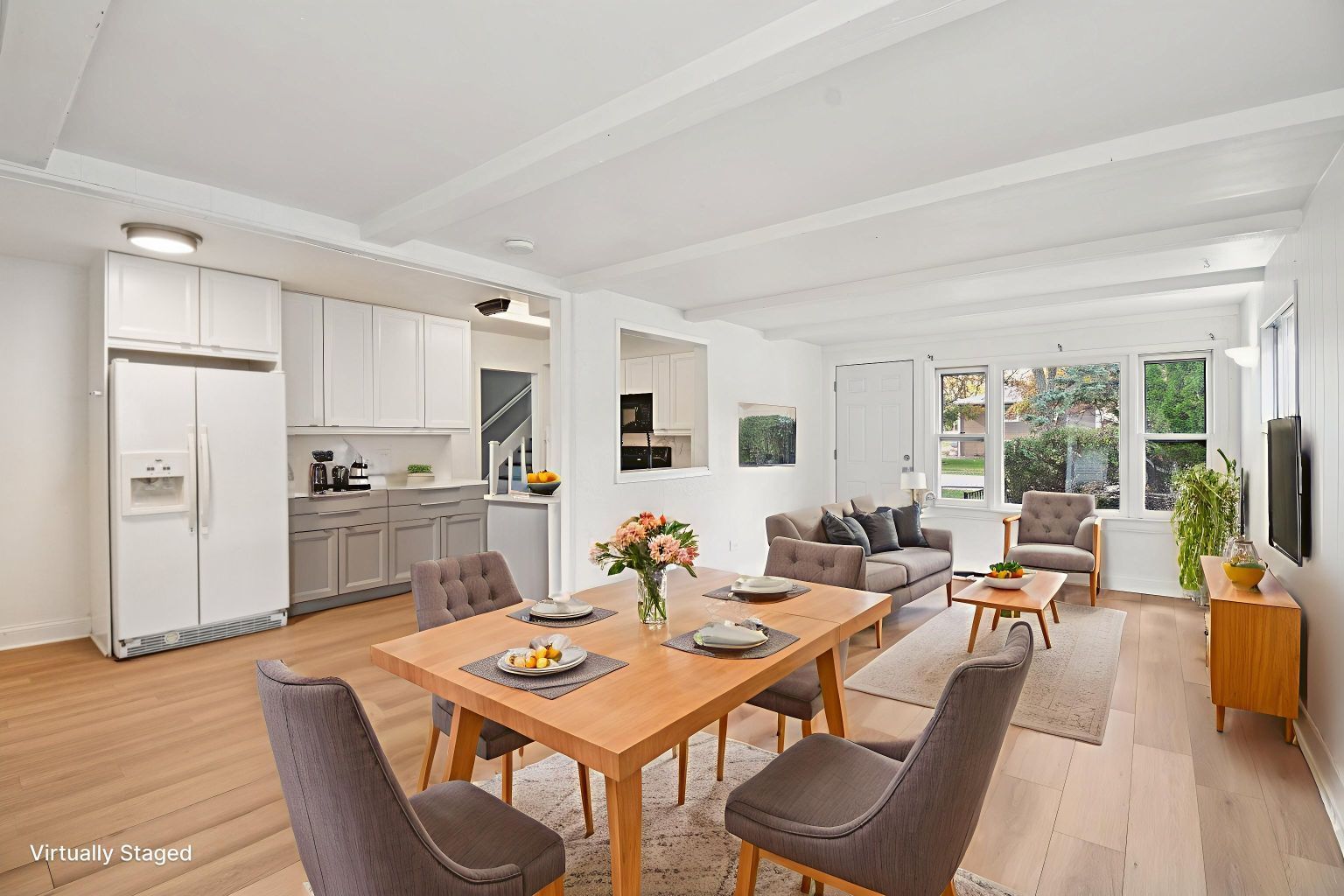 207 North Idlewild Avenue Mundelein, IL 60060 - Photo 4 of 46 a view of a dining room with furniture and wooden floor