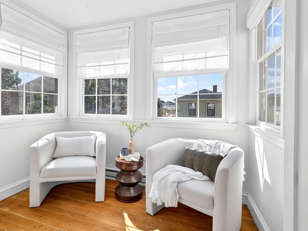 24 Evergreen Street, Unit 2 Boston, MA 02130 - Photo 16 of 31 a living room with furniture and a large window