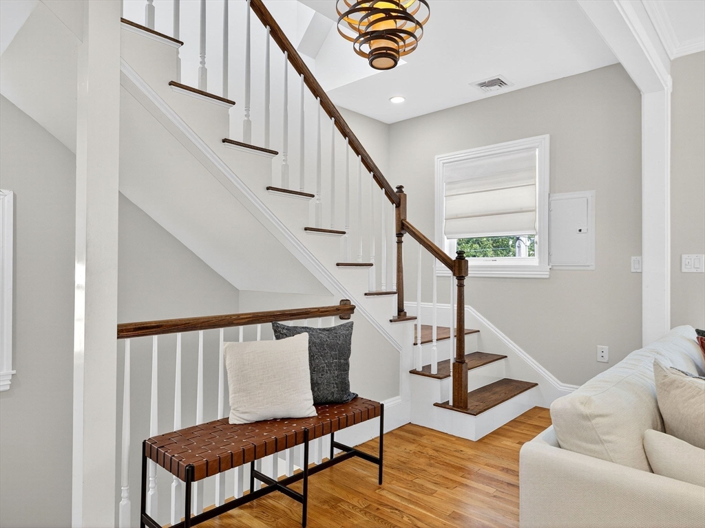 24 Evergreen Street, Unit 2 Boston, MA 02130 - Photo 17 of 31 a view of entryway and hall with wooden floor