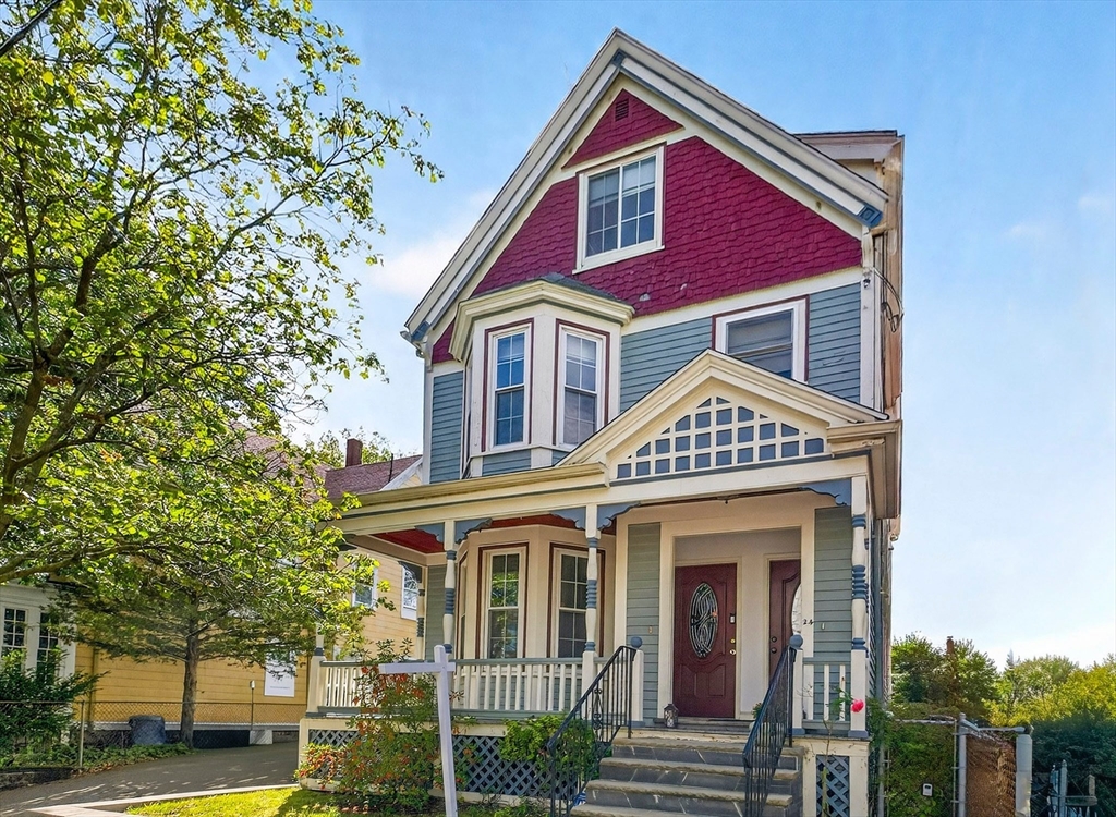 24 Evergreen Street, Unit 2 Boston, MA 02130 - Photo 2 of 31 a front view of a house with a yard