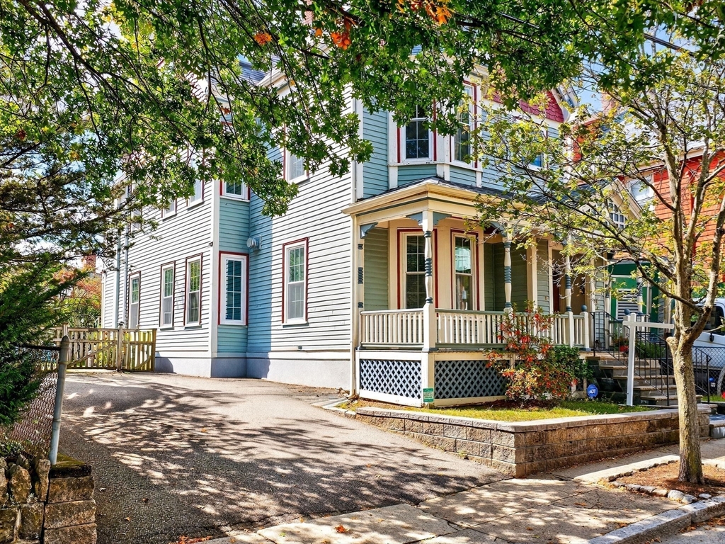 24 Evergreen Street, Unit 2 Boston, MA 02130 - Photo 31 of 31 a front view of a house with a yard