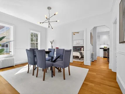 a view of a dining room with furniture